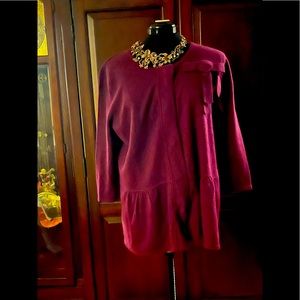 Unique, roomy purplish cardigan w/ruffled bottom, bow on right side of shoulder